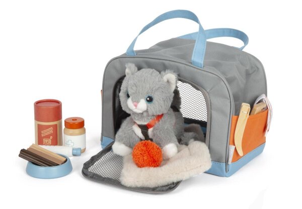 Katze mit Tasche und Pflege-Set